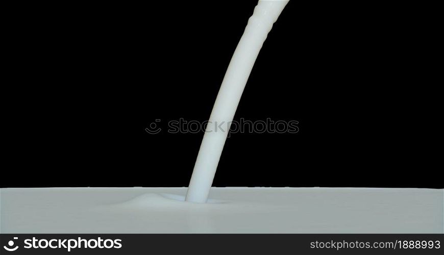 Milk splash on black background 4k. Milk splash on black background