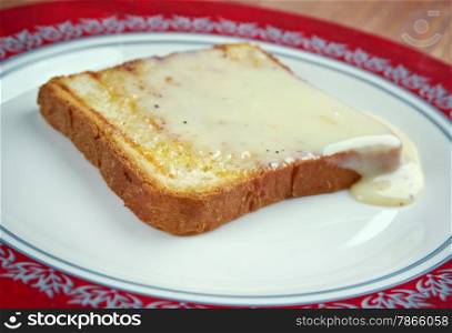 Milk toast - breakfast food of toasted bread in warm milk with sugar and butter In New England region