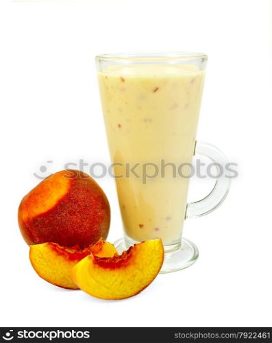 Milkshake in a glass with peaches isolated on white background