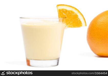 milkshake with a piece of orange. milkshake with a piece of orange and orange in back on white background