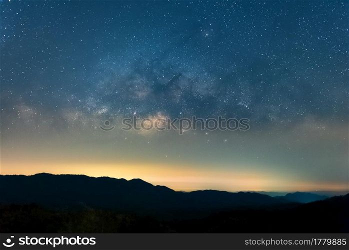 Milky way galaxy with stars and space dust in the universe, long speed exposure. Baan Na Sak, Mae Moh Lampang Thailand.. Milky way