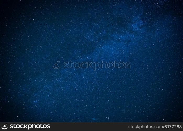 Milky way on the dark night sky. Stars on cosmos background