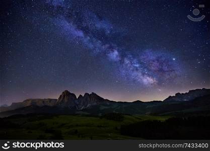 Milky Way over Alpe di Siusi (also known as Seiser Alm) in Dolomites mountain, Sudtirol, Italy. Milky Way over Alpe di Siusi in Dolomites, Italy