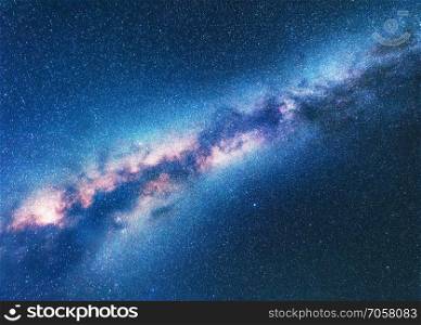 Milky Way. Space background with starry sky. Fantastic night landscape with bright milky way, blue sky full of stars. Shiny stars. Beautiful scene with universe. Astrophotography. Galaxy