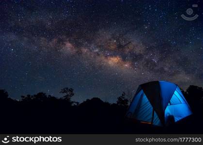 Milky Way with stars and tent in foreground, Family camping in the North Thailand, Lampang.. Milky way and camping.