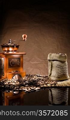 mill and bag with coffee beans