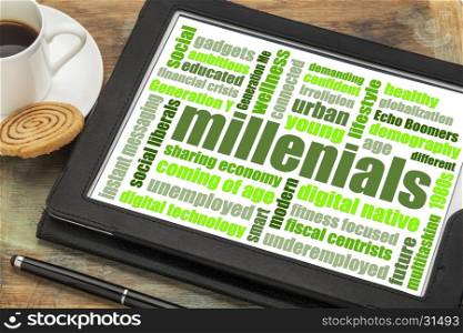 millenials word cloud on a digital tablet with a cup of coffee