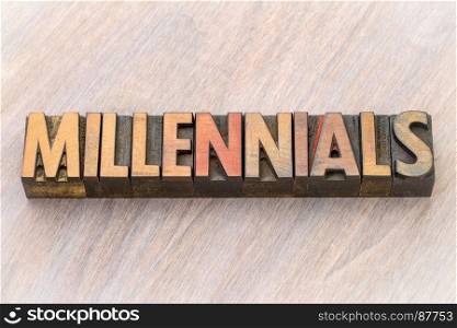 millennials (millennial generation) word abstract in vintage letterpress wood type