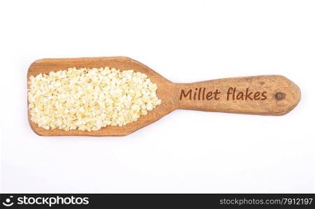 Millet flakes on shovel