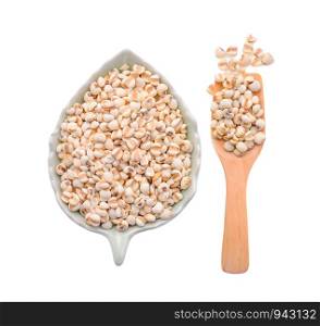 millet grains on white background