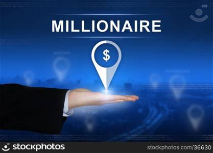 millionaire button with business hand on blurred background