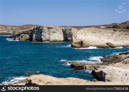 Milos island sea view with rocks and waves. View of Milos island sea with rocks and waves
