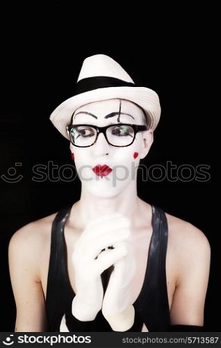 Mime in white hat and glasses