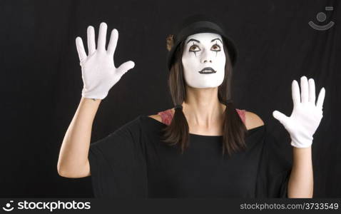 Mime Looks Up During Entertainment Performance