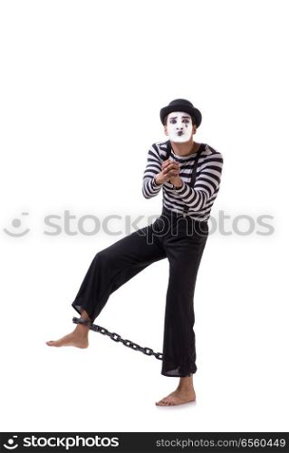 Mime with his feet chained isolated on white