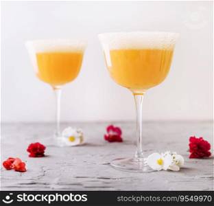 Mimosa alcohol cocktail with orange juice and dry ch&agne