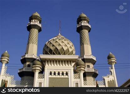 Minarets of green mosque in Malang, Java, Indonesia