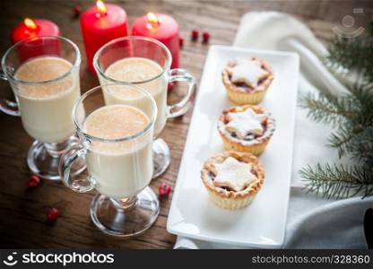 Mince pies with Christmas tree branch