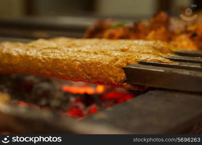 Minced meat being barbecued