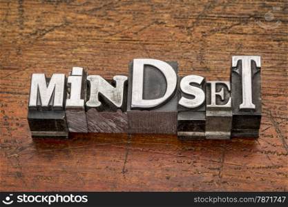mindset word in mixed vintage metal type printing blocks over grunge wood