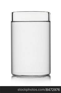 Mineral still water in highball glass on white.