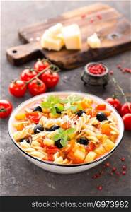 Minestrone, italian vegetarian soup with pasta and vegetables
