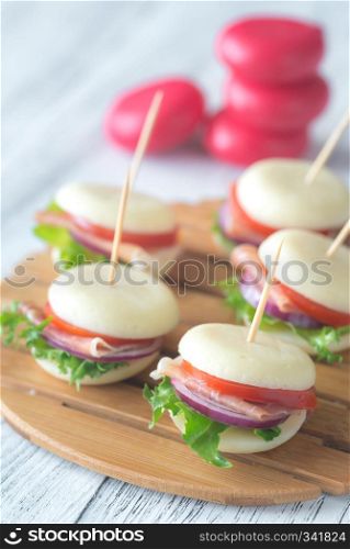 Mini cheese and prosciutto sandwiches