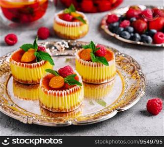 Mini cheesecake with apricot in muffin forms