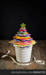 Mini DIY Paper Tree Christmas Decoration on wooden table