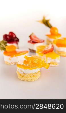 Mini fruit tarts choice creamy desserts petite cakes delicious treat