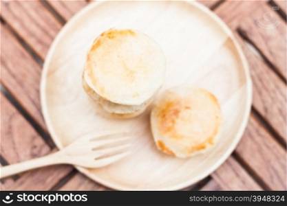 Mini pies on wooden plate, stock photo