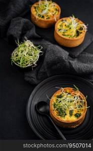 mini quiche with herbs on plate