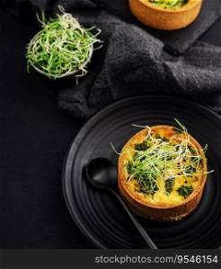 mini quiche with herbs on plate