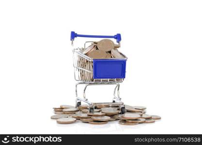 Mini shopping cart with coins on white background