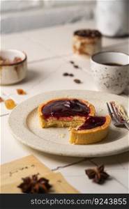 Mini tart with whipped cream cherry and lemon sweet dessert on white plate. Mini tart with whipped cream