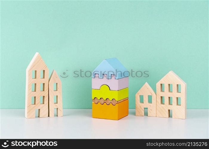 miniature houses blue background