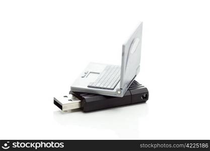 miniature laptop and flash usb isolated on white