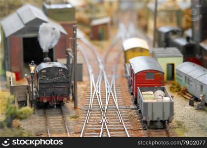 miniature model trains in a freight yard