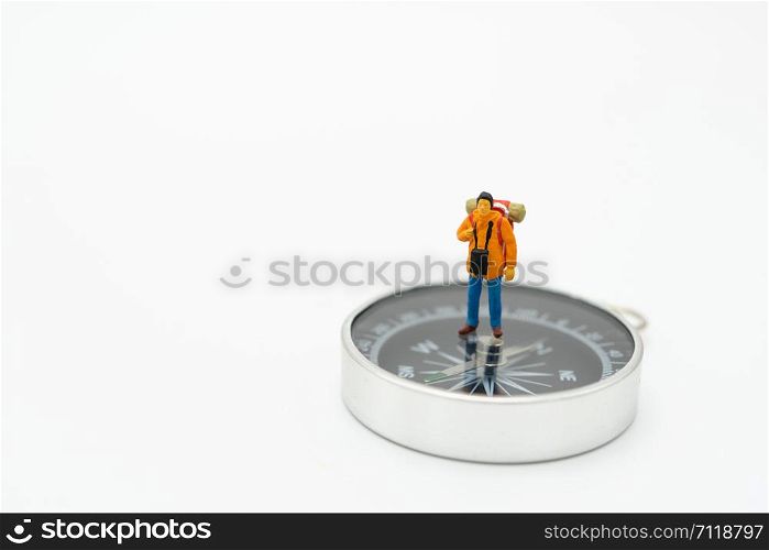 Miniature people stand on The walkway the beginning of the journey To reach the goal. using as background travel concept with copy spaces for your