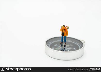 Miniature people stand on The walkway the beginning of the journey To reach the goal. using as background travel concept with copy spaces for your