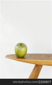 minimal abstract concept apple table front view