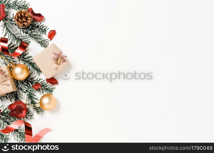 Minimal creative flat lay of christmas traditional composition and new year holiday season. Top view winter christmas decorations on white background with blank space for text. Copy space photography.