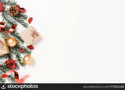 Minimal creative flat lay of christmas traditional composition and new year holiday season. Top view winter christmas decorations on white background with blank space for text. Copy space photography.