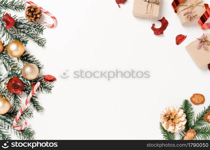 Minimal creative flat lay of christmas traditional composition and new year holiday season. Top view winter christmas decorations on white background with blank space for text. Copy space photography.