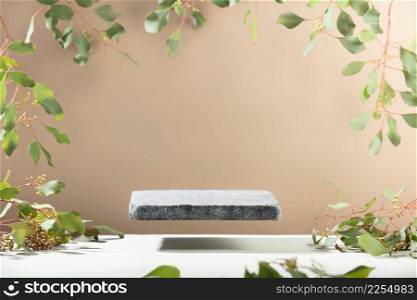 Minimal modern product display on neutral beige background. Flying Stone podium and eucalyptus branches. Concept scene stage showcase for new product, promotion sale, banner, presentation, cosmetic