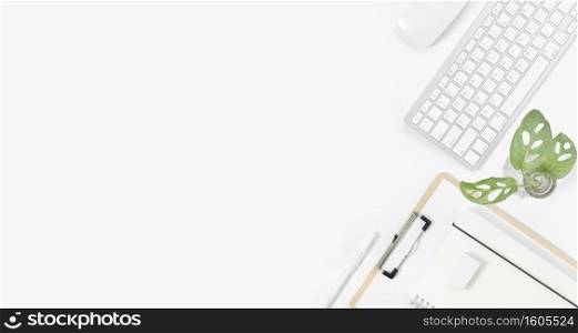Minimal Office desk table top view with office supply and coffee cup on a white table with copy space, White color workplace composition, flat lay
