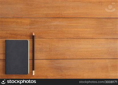 Minimal work space - Creative flat lay photo of workspace desk. Office desk wooden table background with mock up notebooks and pencil and plant. Top view with copy space, flat lay photography.