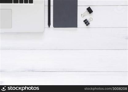 Minimal work space - Creative flat lay photo of workspace desk. Top view office desk with laptop, mock up notebooks on white wooden background. Top view with copy space, flat lay photography