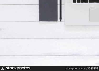 Minimal work space - Creative flat lay photo of workspace desk. Top view office desk with laptop, mock up notebooks on white wooden background. Top view with copy space, flat lay photography