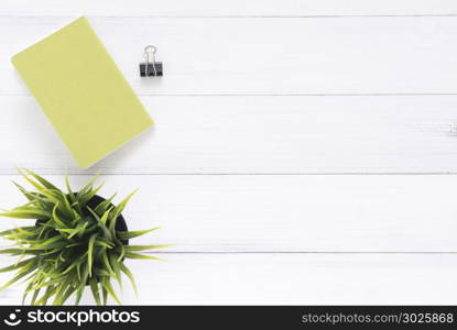 Minimal work space - Creative flat lay photo of workspace desk. White office desk wooden table background with mock up notebooks and plant. Top view with copy space, flat lay photography